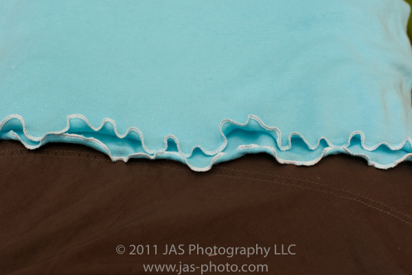 stretched and ruffled rolled edge on t-shirt dress