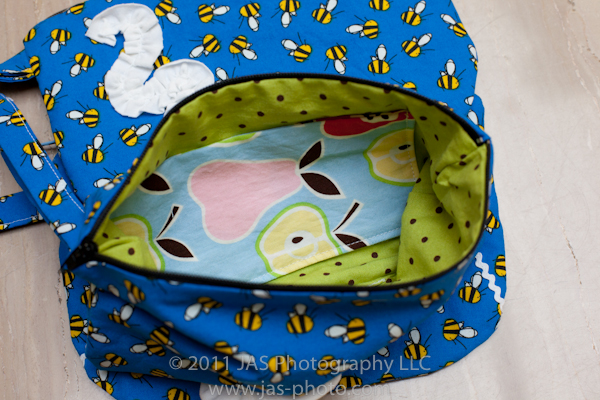 cute wristlets made with whimisical fabric as a teacher's thankyou gift with flower and ric rac embellishments