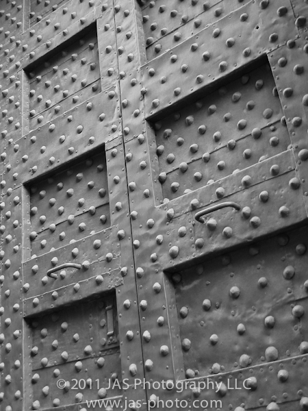 close up of a spiked door in Italy for the daily post's weekly photo challenge on entrance