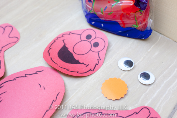 googly eyes and scalloped nose for build your own elmo