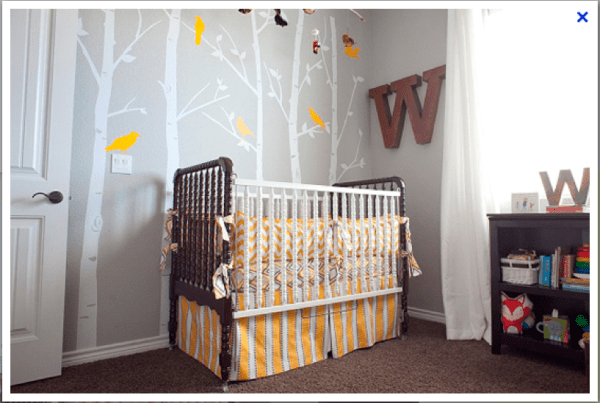 gray and yellow nursery with tree decals